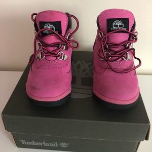 Pink and black Timberland toddler boots